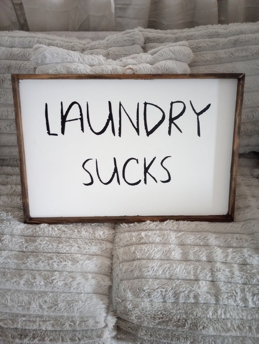 Laundry sucks sign